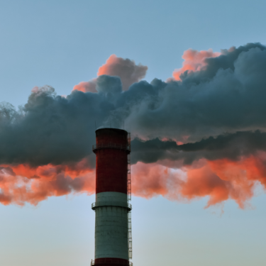 factory chimneys showcasing climate risks