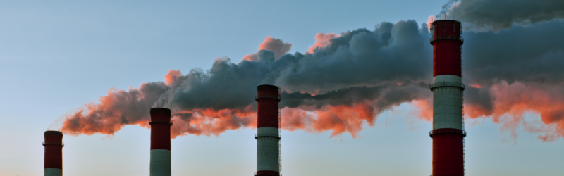 factory chimneys showcasing climate risks