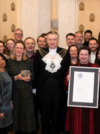 Queens award presentation team photo