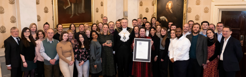 Queens award presentation team photo