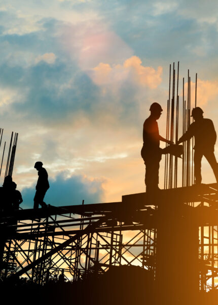 Silhouette,Of,Engineer,And,Construction,Team,Working,At,Site,Over